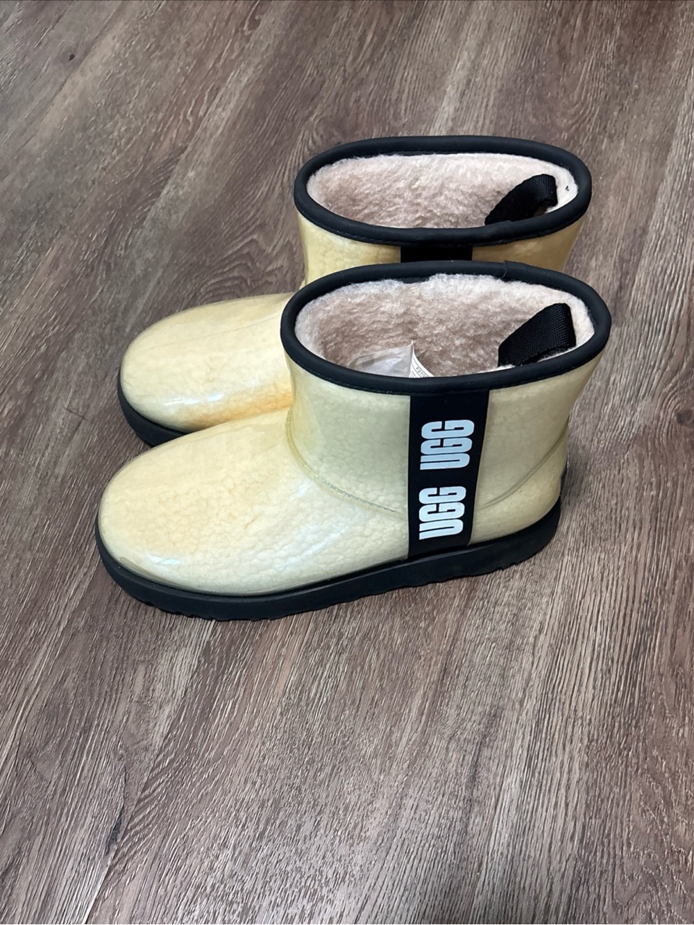 UGG Womens Waterproof Short Boot in cream color with Black Trim
